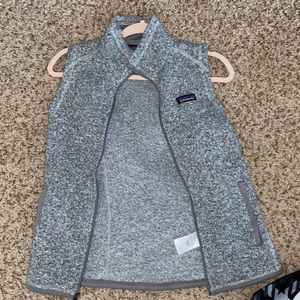 a grey Patagonia vest/jacket